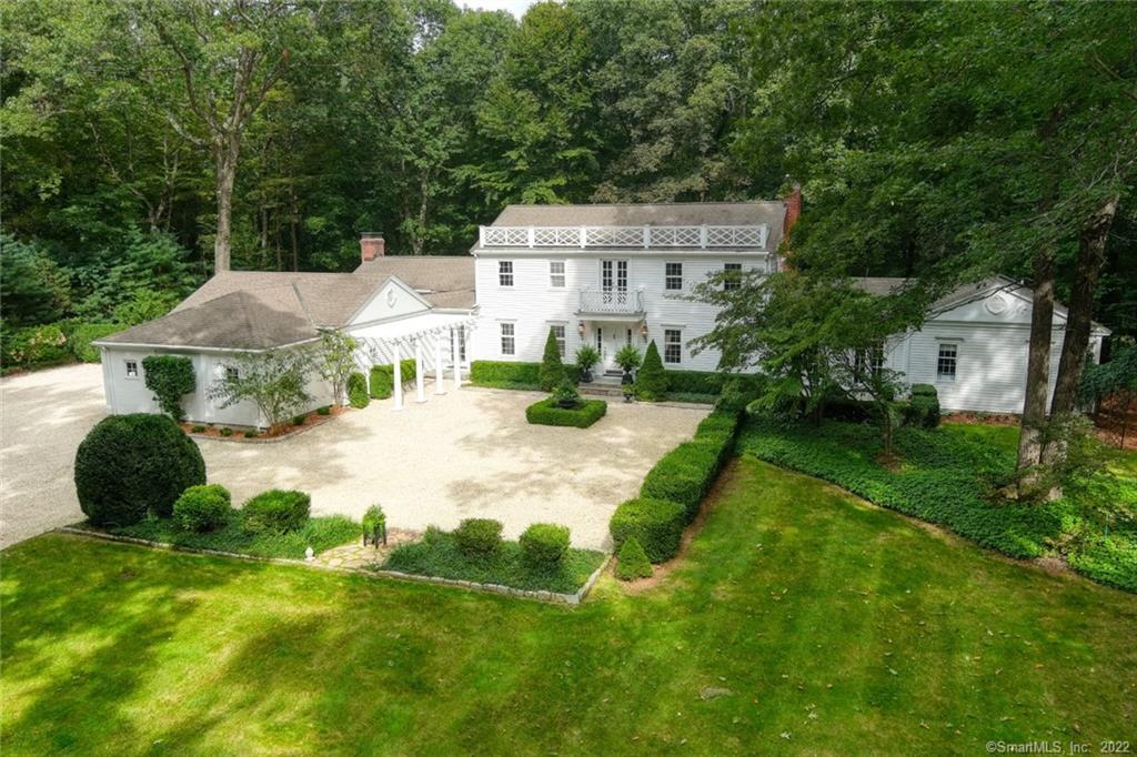 Welcome to this very special residence - 46 Indian Hill Road - offering 5 Bedrooms on 1.8 professionally landscaped acres in beautiful north Wilton, Connecticut.