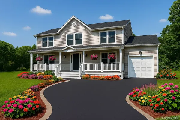 a front view of a house with a yard and seating space