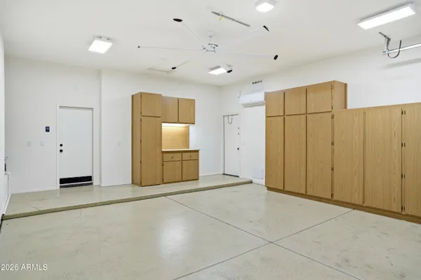 a view of a livingroom with kitchen