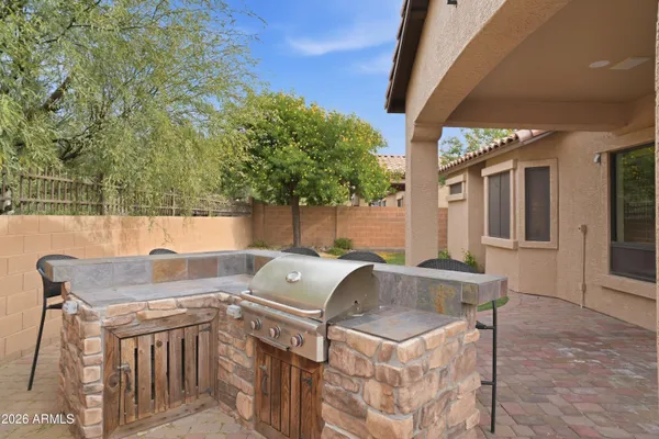 a view of backyard with seating space