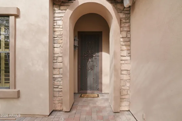 a view of a house with a yard and garage