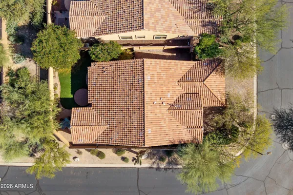 an aerial view of residential houses and city view