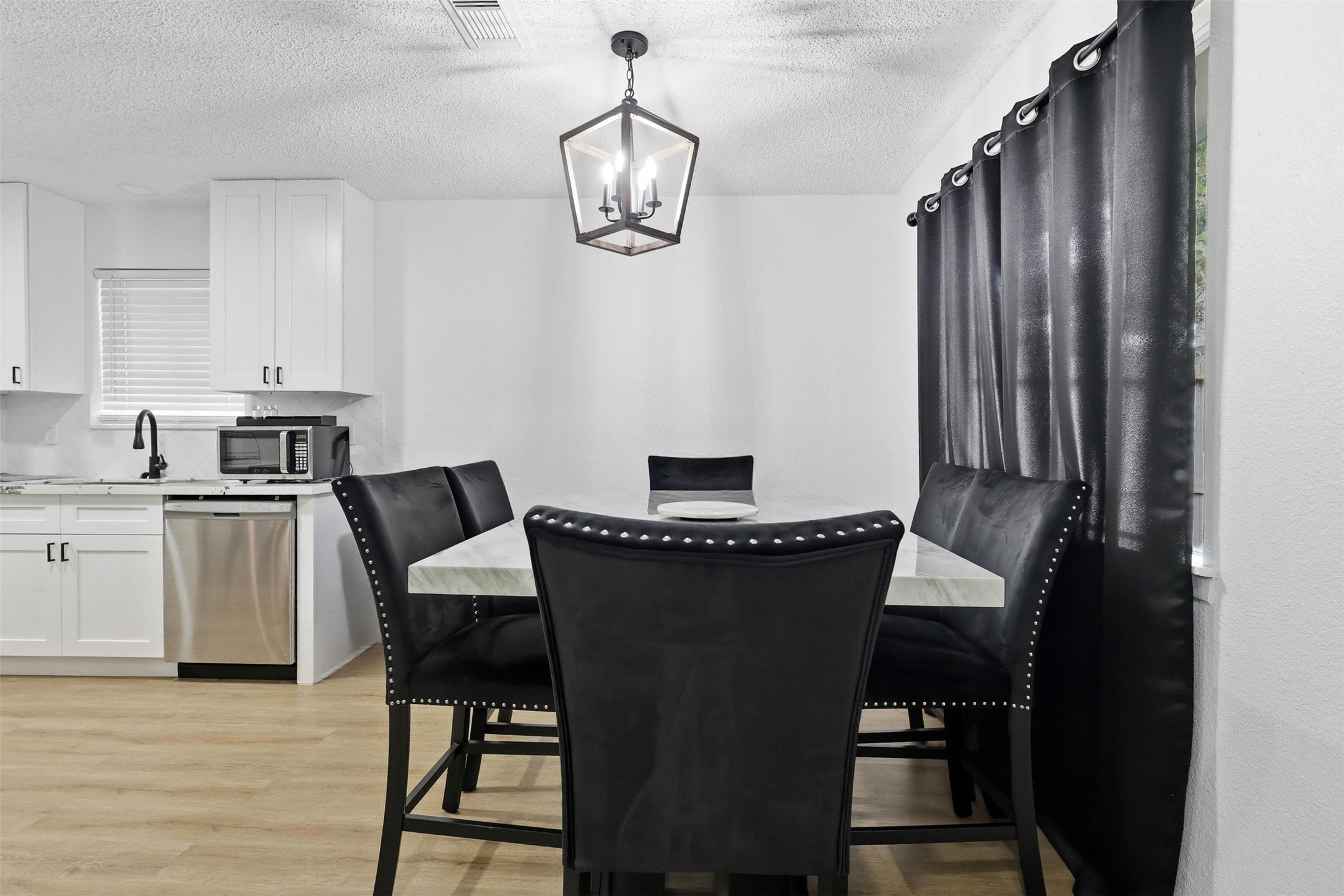23310 Dew Wood Lane Spring, TX 77373 - Photo 11 of 24 Open-concept dining perfect for hosting, with modern finishes