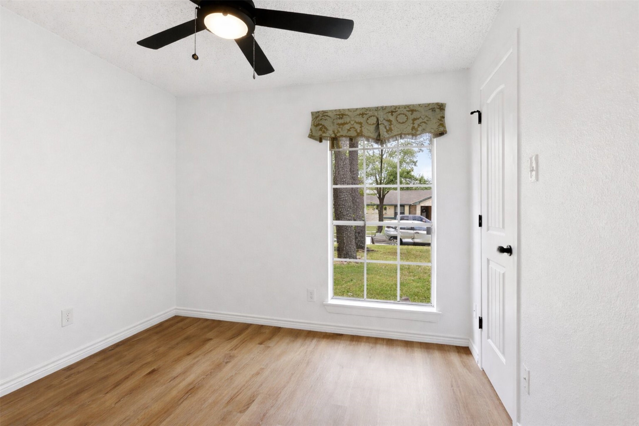 23310 Dew Wood Lane Spring, TX 77373 - Photo 16 of 24 Generously sized third bedroom, perfect for family, guests, or an office.