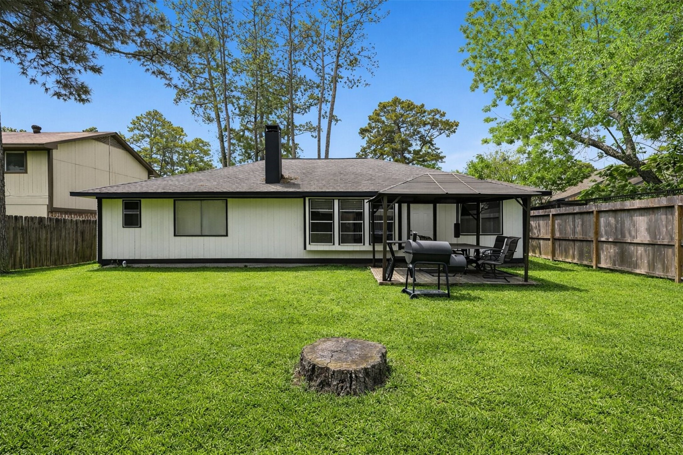 23310 Dew Wood Lane Spring, TX 77373 - Photo 22 of 24 Private backyard oasis perfect for summer entertaining