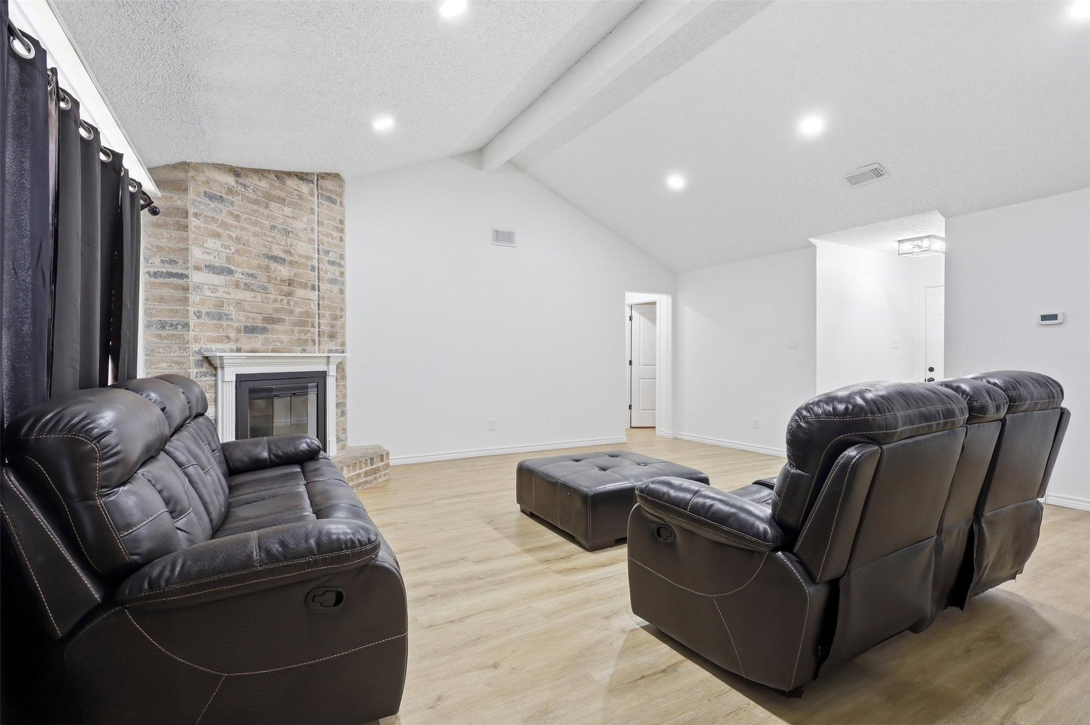 23310 Dew Wood Lane Spring, TX 77373 - Photo 24 of 24 Bright, open floor plan features a cozy fireplace and modern recessed lighting