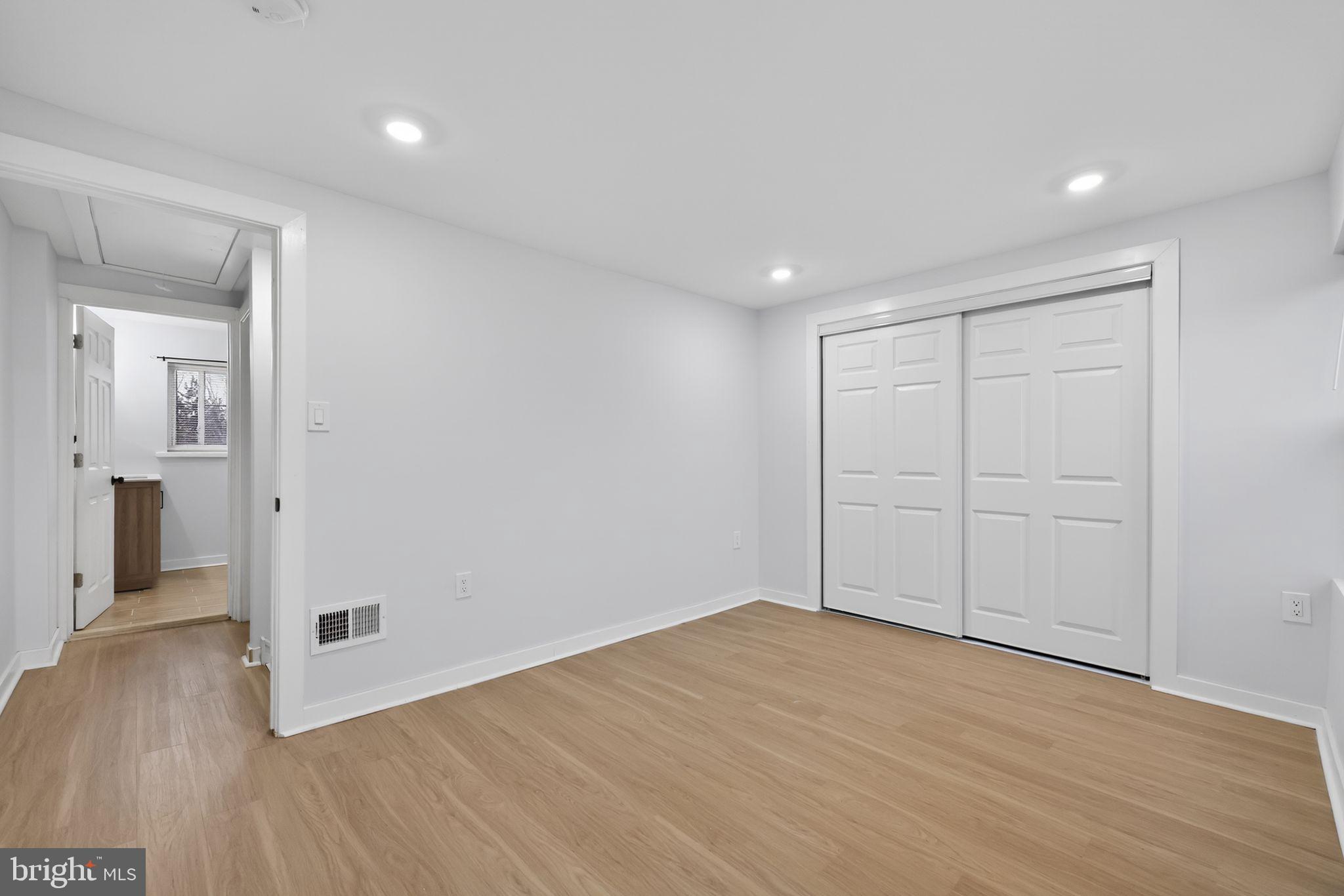 3055 Kearsarge Road Camden, NJ 08104 - Photo 16 of 26 a view of an empty room with wooden floor