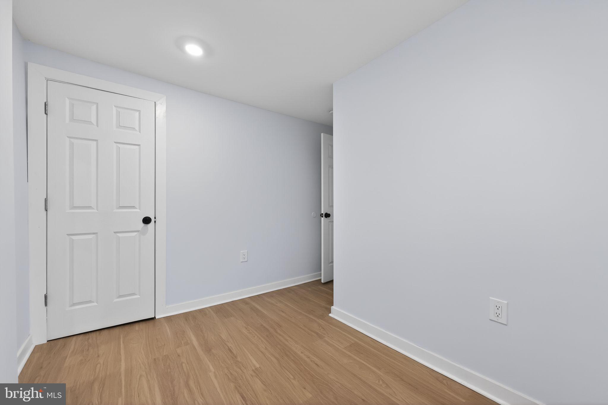 3055 Kearsarge Road Camden, NJ 08104 - Photo 23 of 26 a view of an empty room with wooden floor