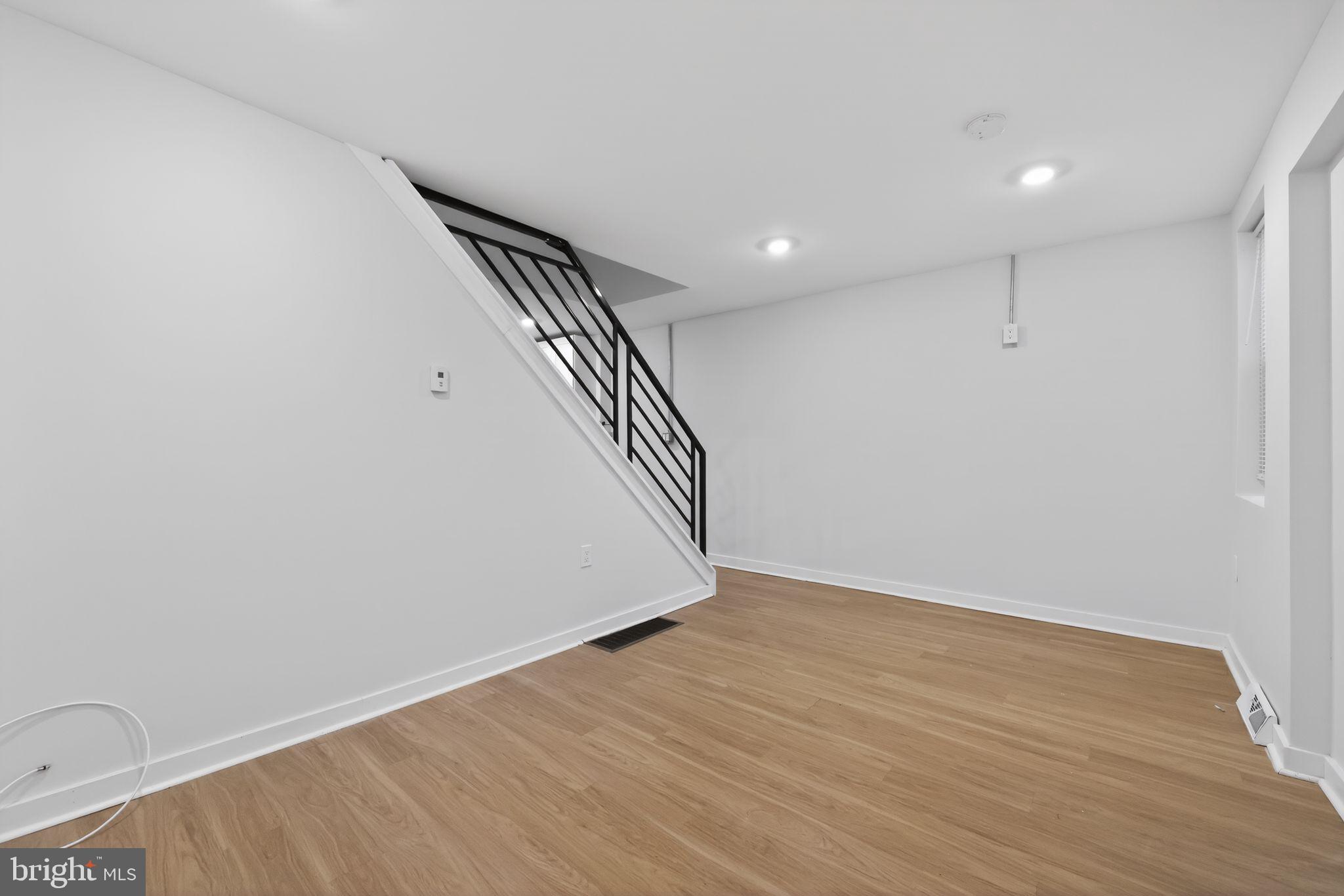 3055 Kearsarge Road Camden, NJ 08104 - Photo 5 of 26 wooden floor in an empty room