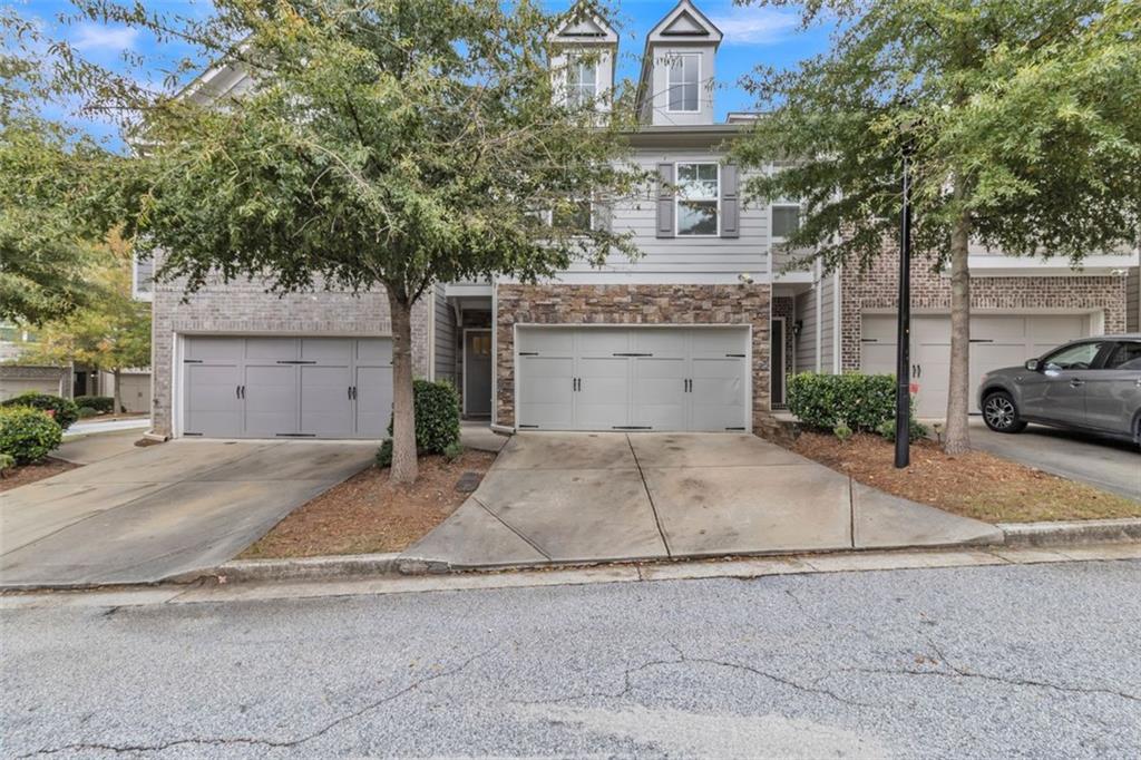 1563 Butternut Cove Stone Mountain, GA 30083 - Photo 2 of 35 front view of a house with a street