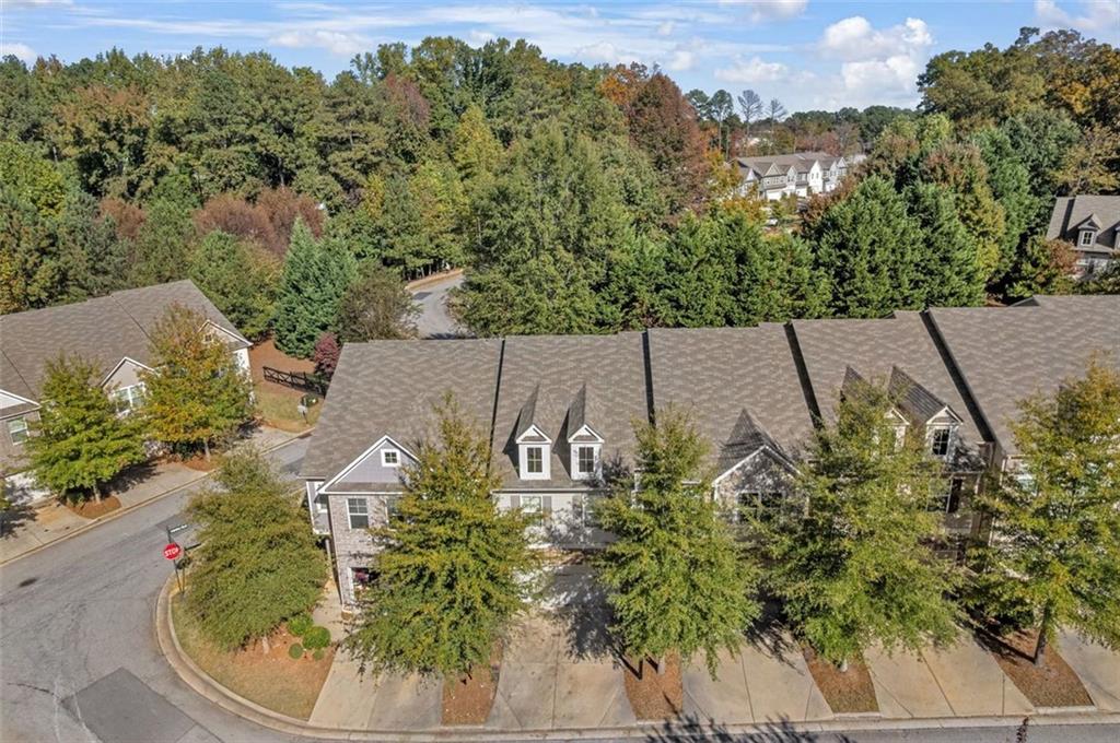 1563 Butternut Cove Stone Mountain, GA 30083 - Photo 33 of 35 an aerial view of a house with a yard
