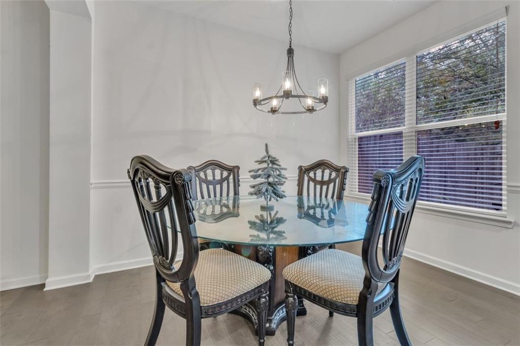 1563 Butternut Cove Stone Mountain, GA 30083 - Photo 8 of 35 a view of a dining room with furniture window and outside view