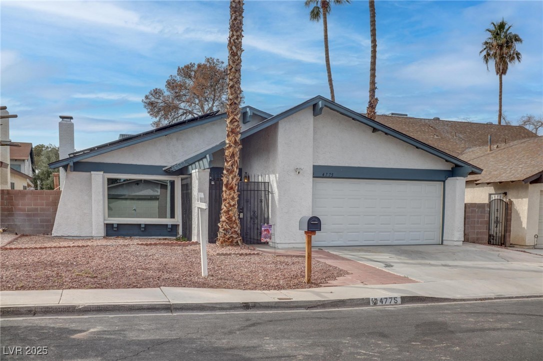 4775 Monaco Road Las Vegas, NV 89121 - Photo 1 of 31 Single story home featuring a garage