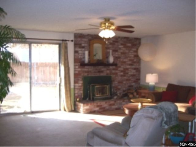 2811 Chavez Drive Reno, NV 89502 - Photo 3 of 6 a living room with furniture and a fireplace