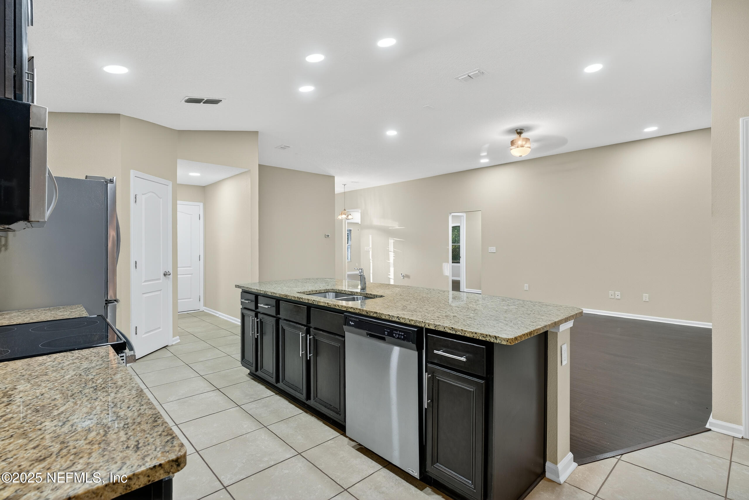 15885 Bainebridge Drive Jacksonville, FL 32218 - Photo 12 of 46 a kitchen with lots of counter top space sink and refrigerator