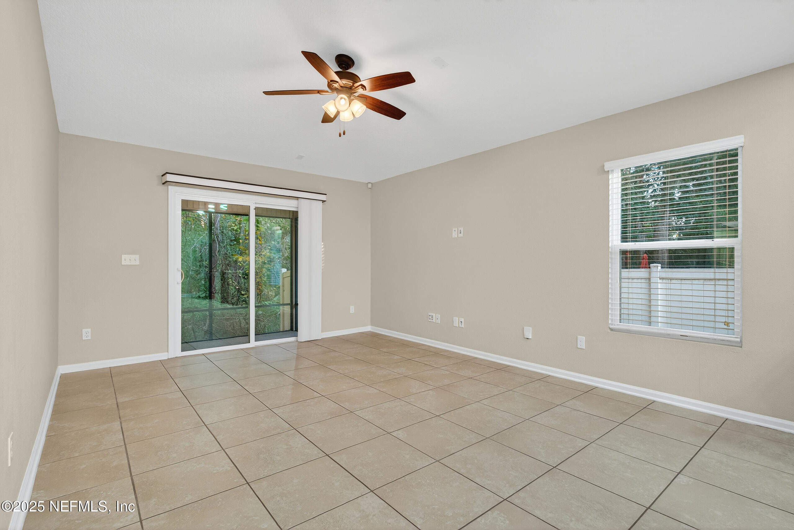 15885 Bainebridge Drive Jacksonville, FL 32218 - Photo 13 of 46 a view of an empty room with a window