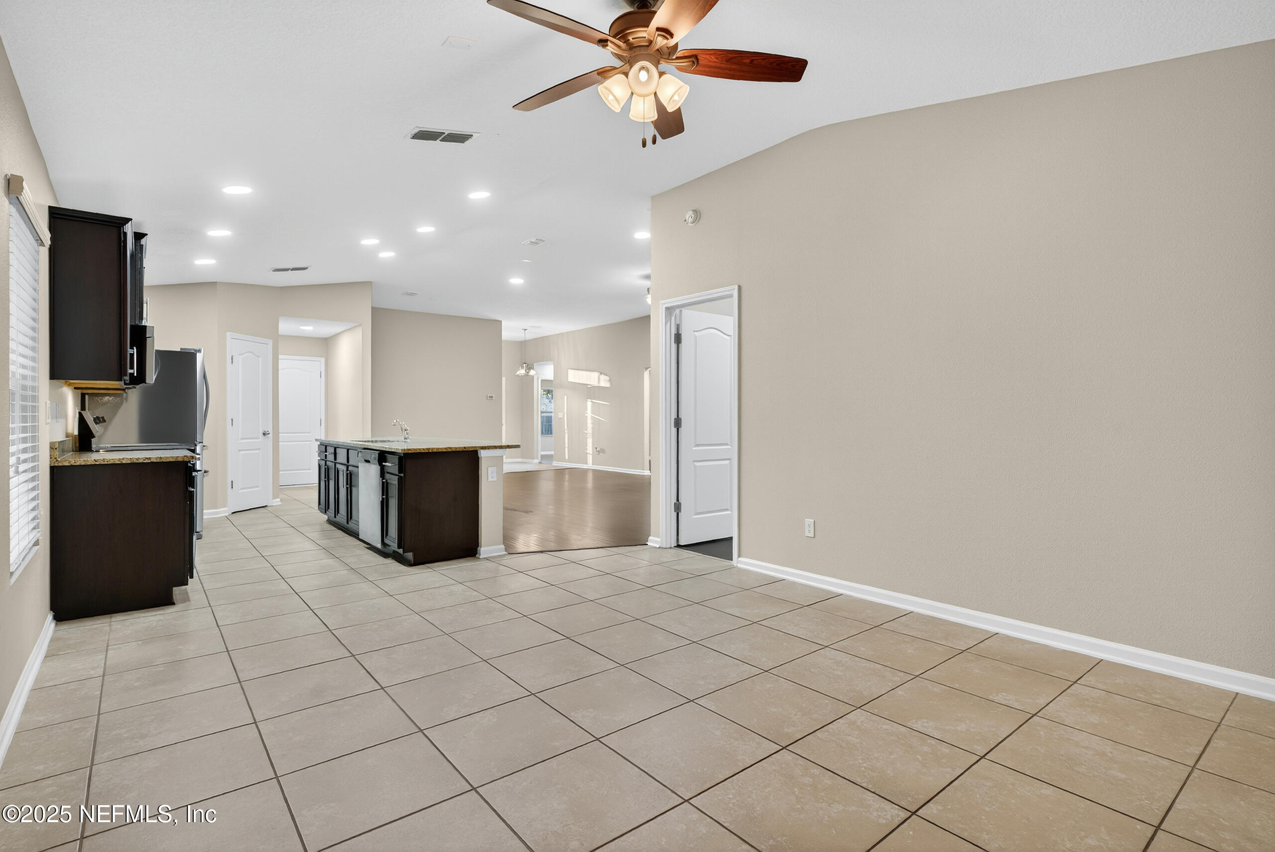 15885 Bainebridge Drive Jacksonville, FL 32218 - Photo 14 of 46 a view of a kitchen with microwave and cabinets