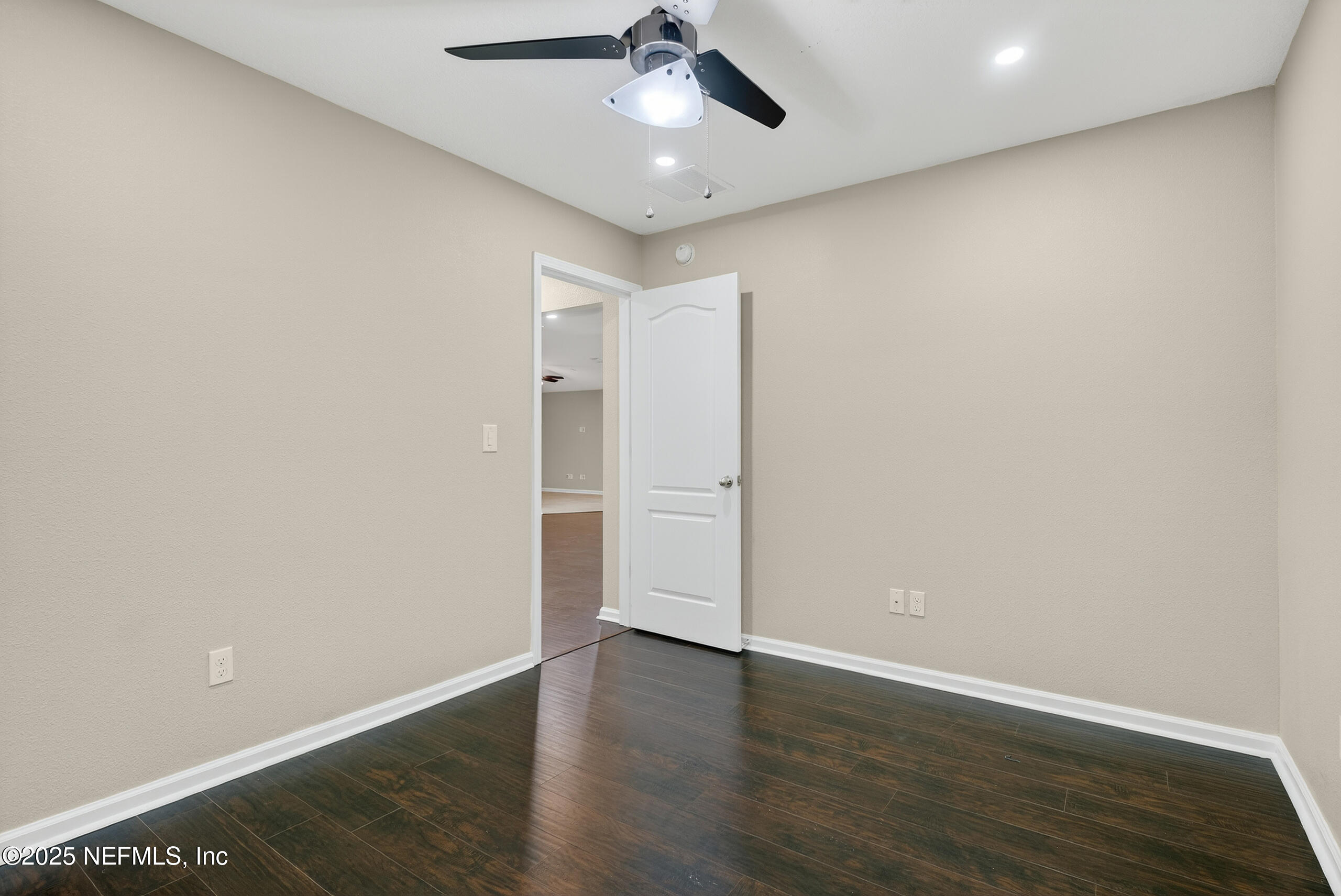 15885 Bainebridge Drive Jacksonville, FL 32218 - Photo 21 of 46 wooden floor in an empty room
