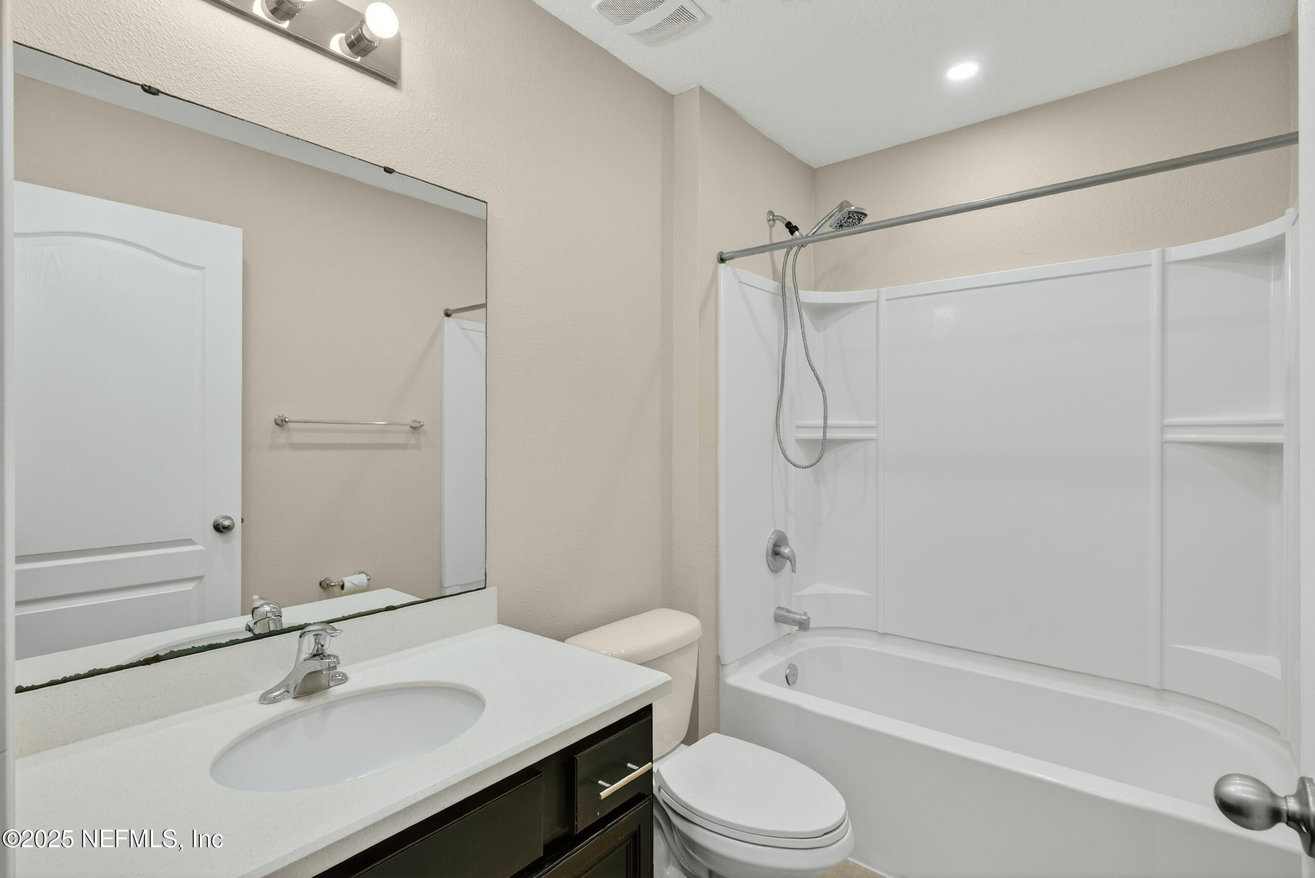 15885 Bainebridge Drive Jacksonville, FL 32218 - Photo 29 of 46 a bathroom with a sink toilet a bathtub and shower