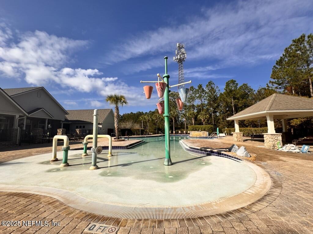 15885 Bainebridge Drive Jacksonville, FL 32218 - Photo 41 of 46 a view of a swimming pool with a patio