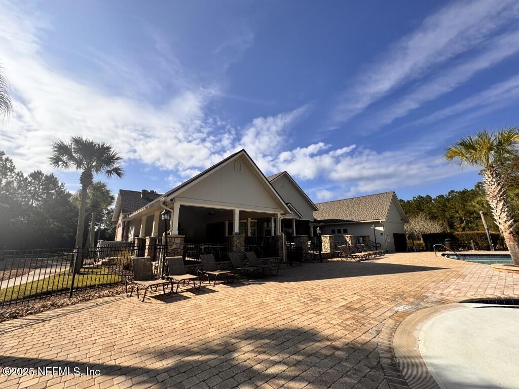 15885 Bainebridge Drive Jacksonville, FL 32218 - Photo 42 of 46 a view of a house with snow on the side of the road