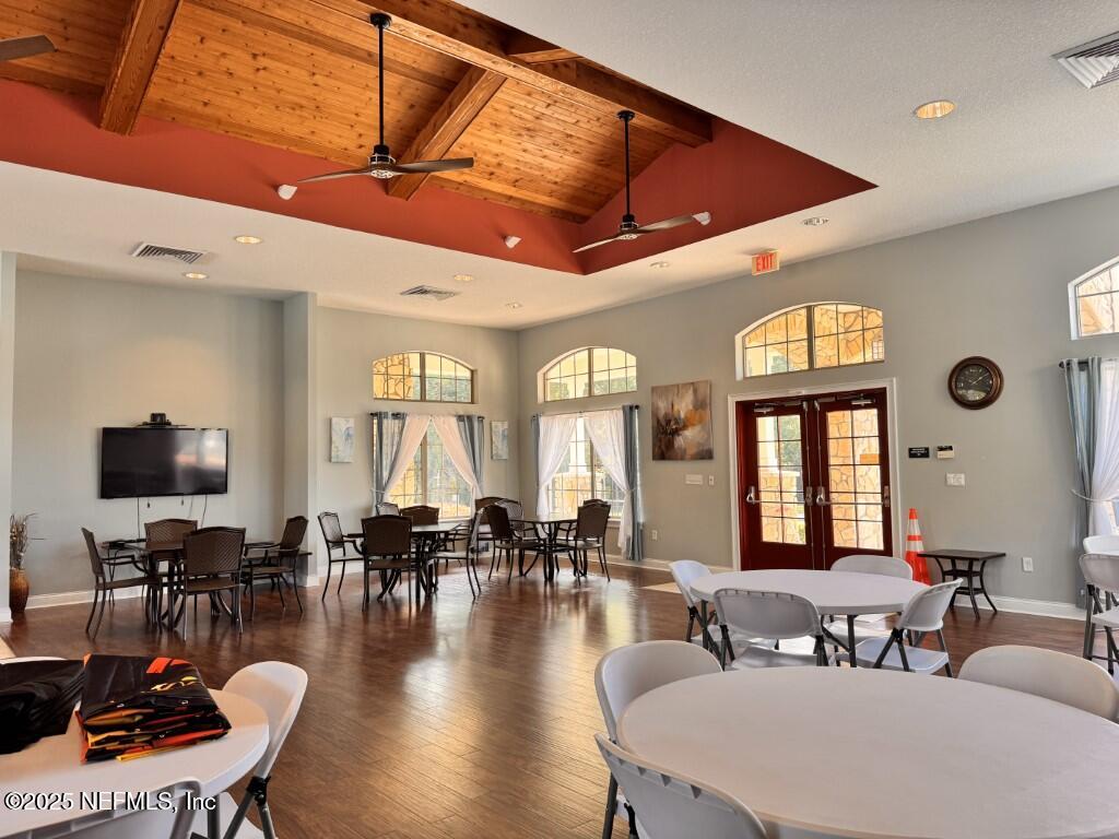 15885 Bainebridge Drive Jacksonville, FL 32218 - Photo 46 of 46 a living room with furniture a wooden floor and a fireplace