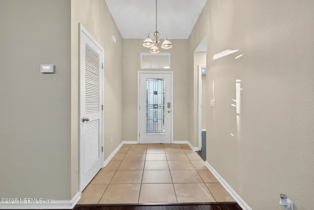 a view of a hallway with entryway