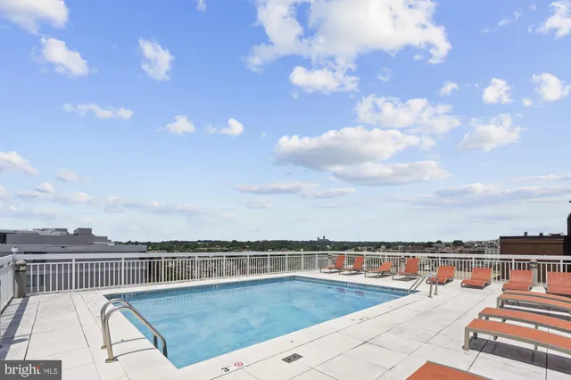 a view of a balcony with an ocean