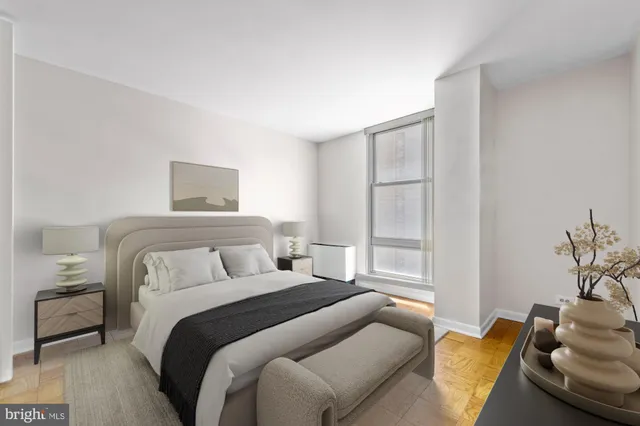 a bedroom with a bed and a couch