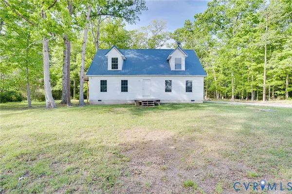 front view of a house with a big yard