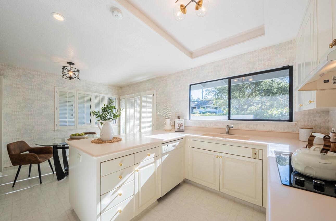 33 Country Club Gate Pacific Grove, CA 93950 - Photo 16 of 40 a view of a kitchen area with a sink and cabinets