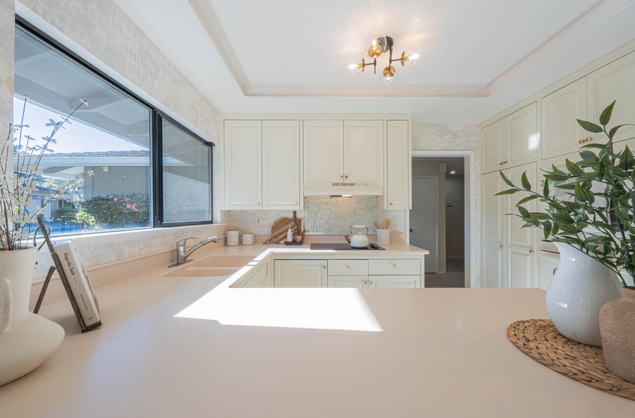 33 Country Club Gate Pacific Grove, CA 93950 - Photo 17 of 40 a large white kitchen with a large window