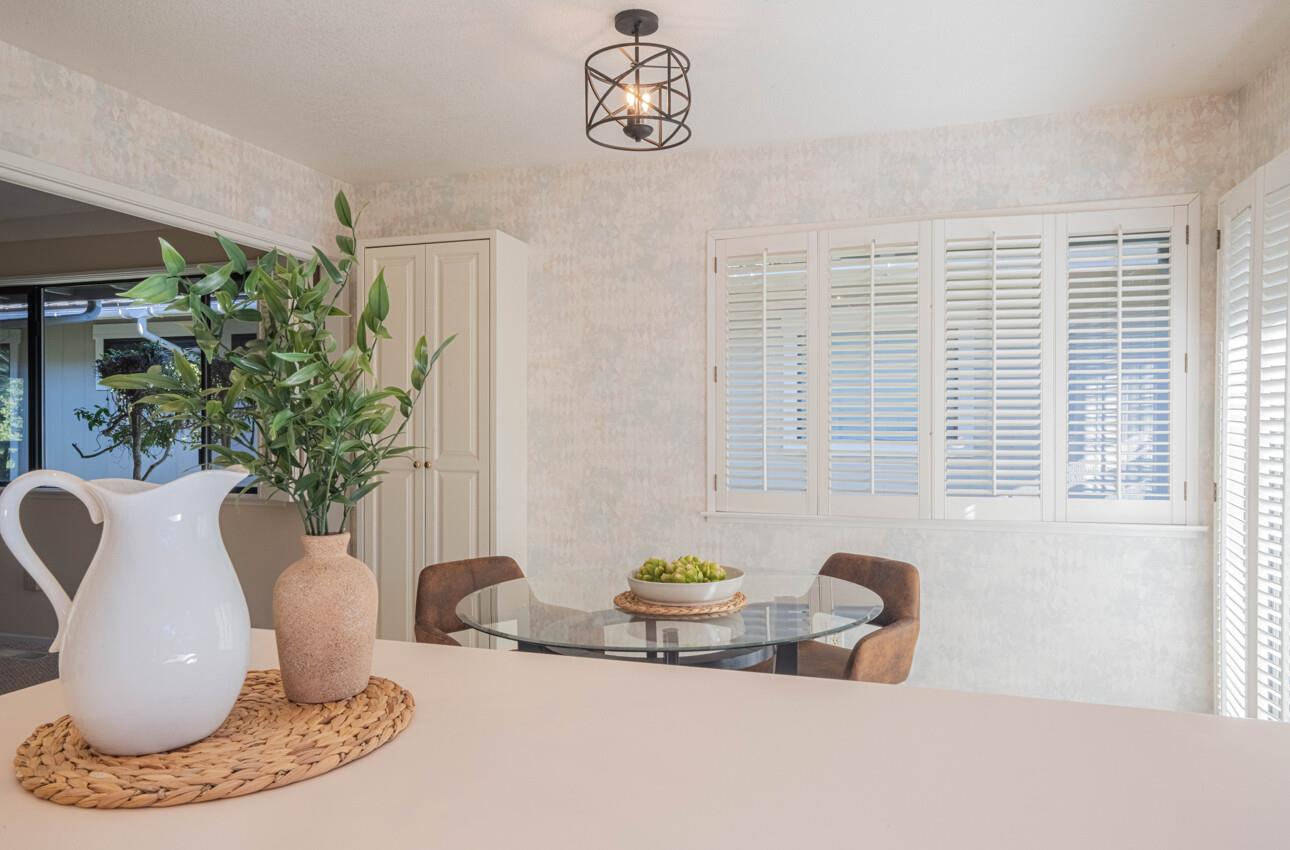 33 Country Club Gate Pacific Grove, CA 93950 - Photo 20 of 40 a view of table and chair with potted plant