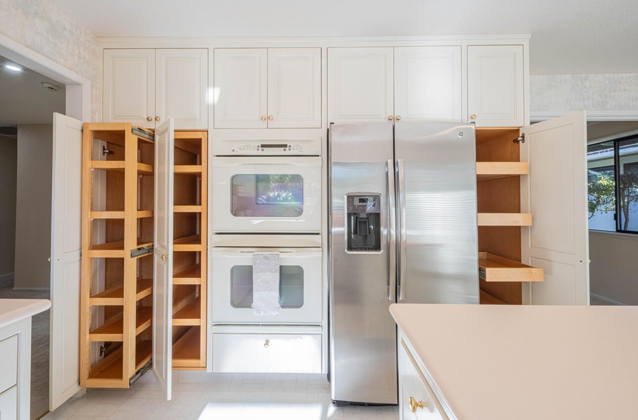 33 Country Club Gate Pacific Grove, CA 93950 - Photo 22 of 40 a kitchen with stainless steel appliances a refrigerator and cabinets