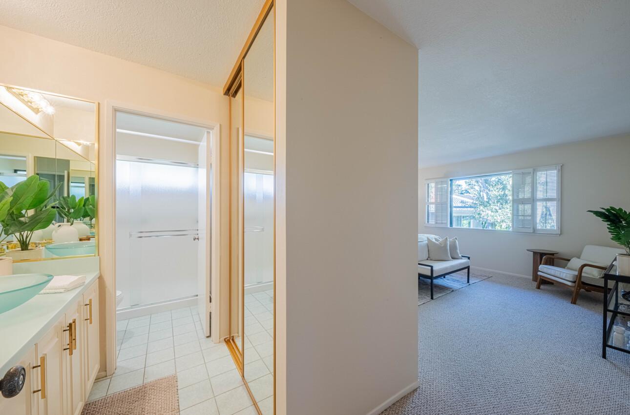 33 Country Club Gate Pacific Grove, CA 93950 - Photo 24 of 40 a bathroom with a sink a mirror and a bathtub