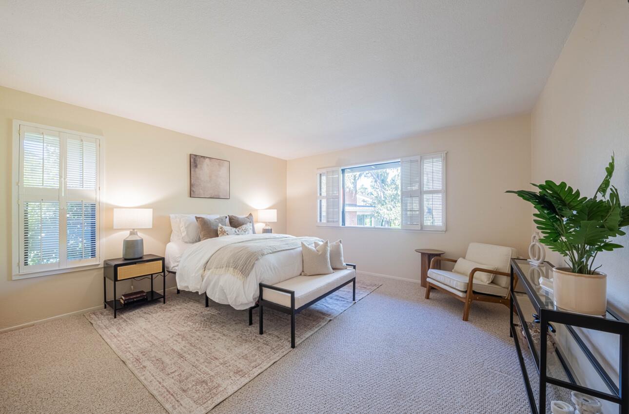 33 Country Club Gate Pacific Grove, CA 93950 - Photo 25 of 40 a bed room with a bed and a chair