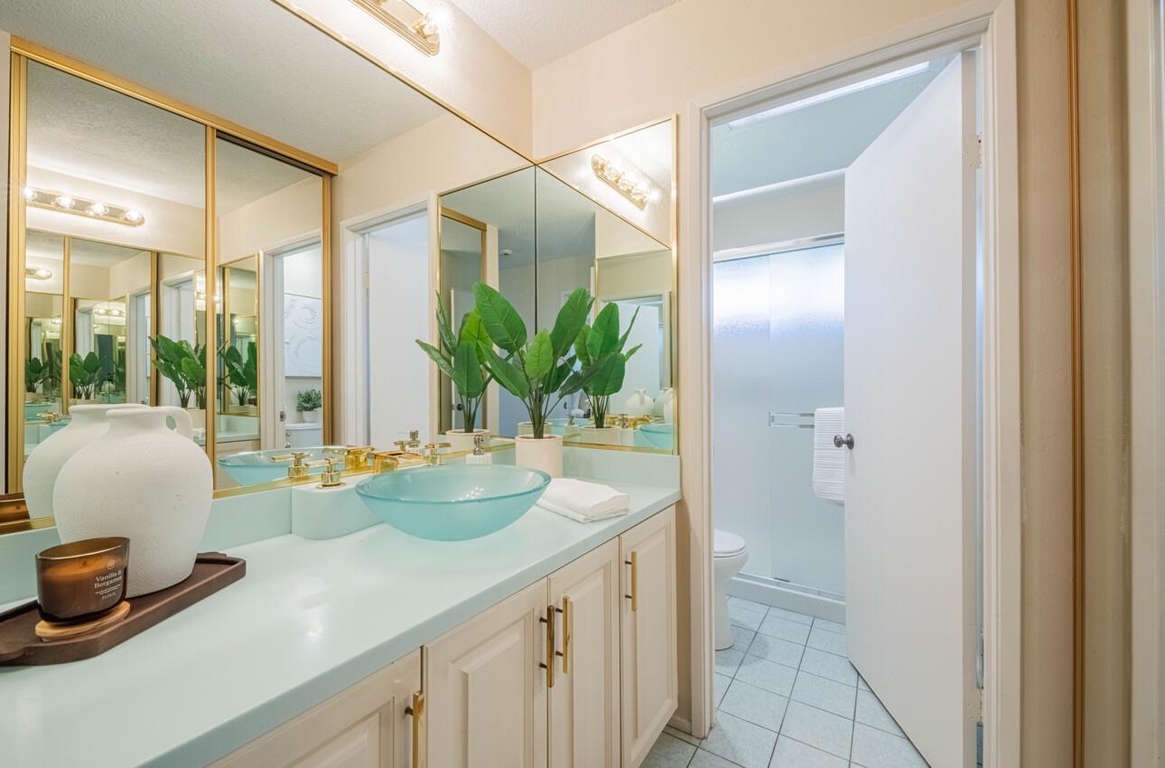 33 Country Club Gate Pacific Grove, CA 93950 - Photo 29 of 40 a bathroom with a sink and a mirror