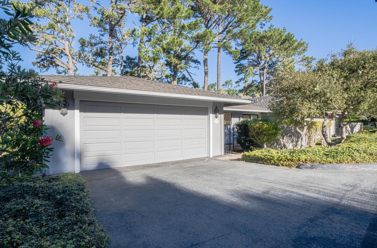 33 Country Club Gate Pacific Grove, CA 93950 - Photo 3 of 40 a front view of a house with a yard and garage
