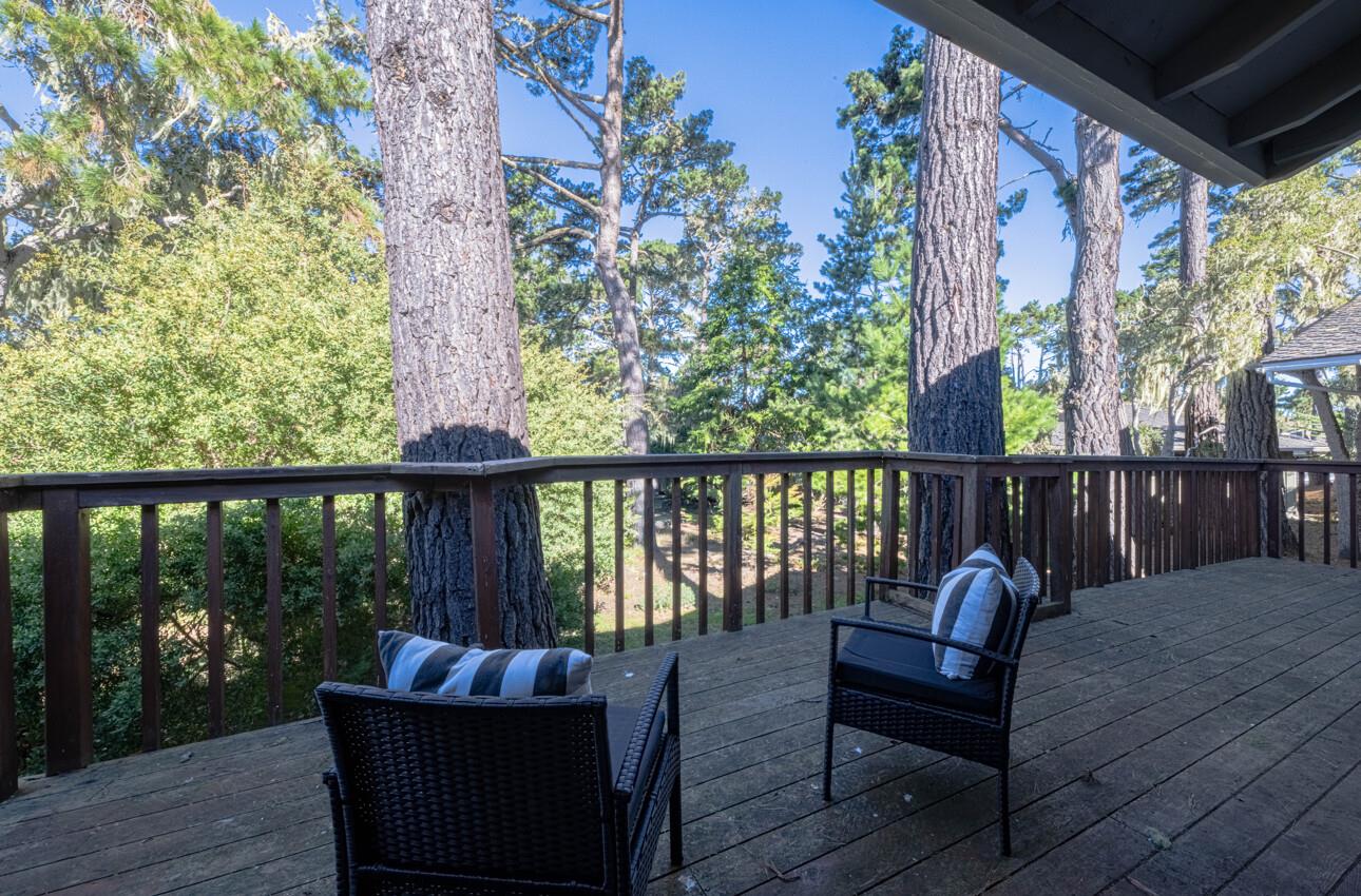 33 Country Club Gate Pacific Grove, CA 93950 - Photo 32 of 40 a balcony with wooden floor and outdoor seating