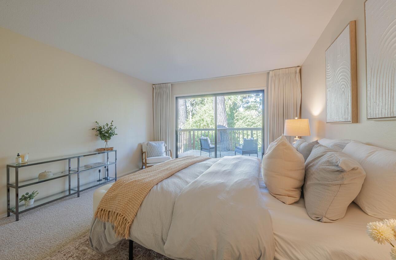 33 Country Club Gate Pacific Grove, CA 93950 - Photo 35 of 40 a bed sitting in a bedroom next to a window