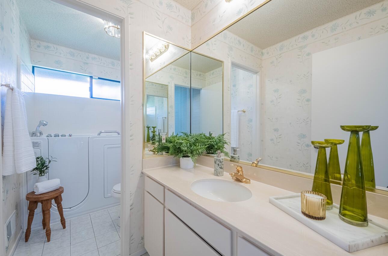 33 Country Club Gate Pacific Grove, CA 93950 - Photo 36 of 40 a bathroom with a sink and a mirror