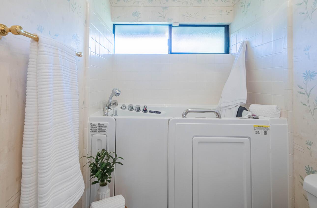 33 Country Club Gate Pacific Grove, CA 93950 - Photo 37 of 40 a utility room with dryer and washer