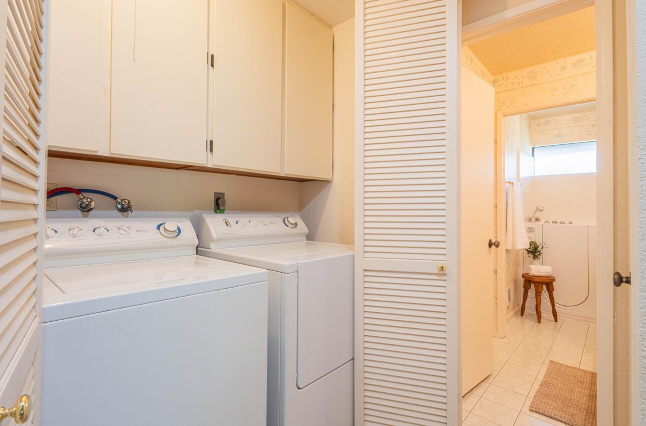 33 Country Club Gate Pacific Grove, CA 93950 - Photo 38 of 40 a utility room with dryer and washer