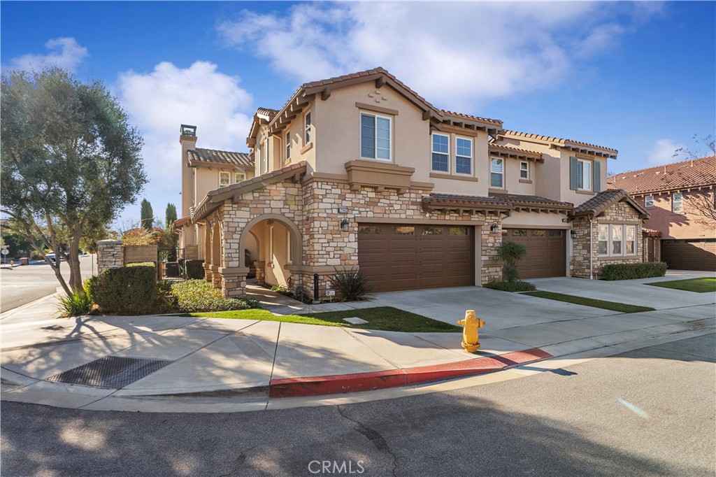 17862 Via Roma Yorba Linda, CA 92886 - Photo 1 of 1 a front view of a house with a yard