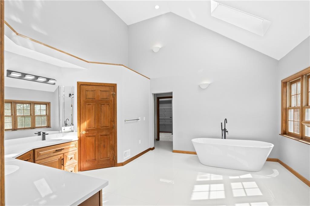 129 Purvis Road Butler, PA 16001 - Photo 29 of 50 a spacious bathroom with a tub and sink