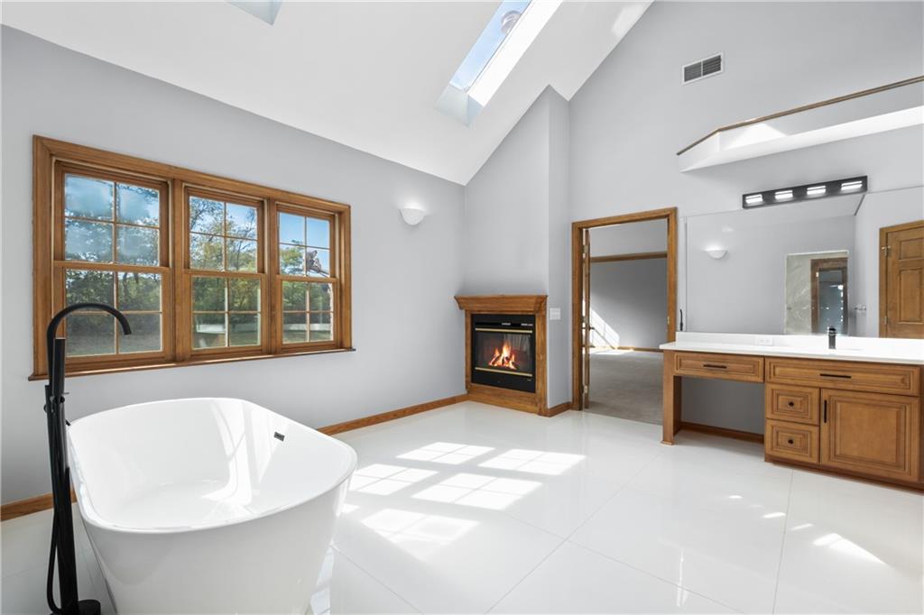 129 Purvis Road Butler, PA 16001 - Photo 31 of 50 a spacious bathroom with a tub sink and mirror
