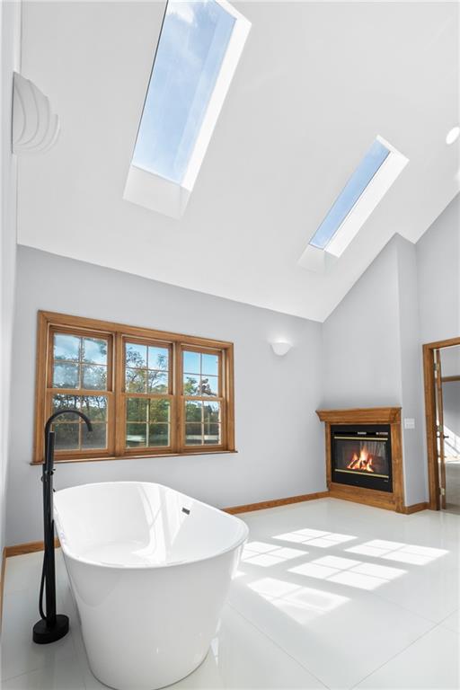 129 Purvis Road Butler, PA 16001 - Photo 32 of 50 a white tub sitting in a room next to a window