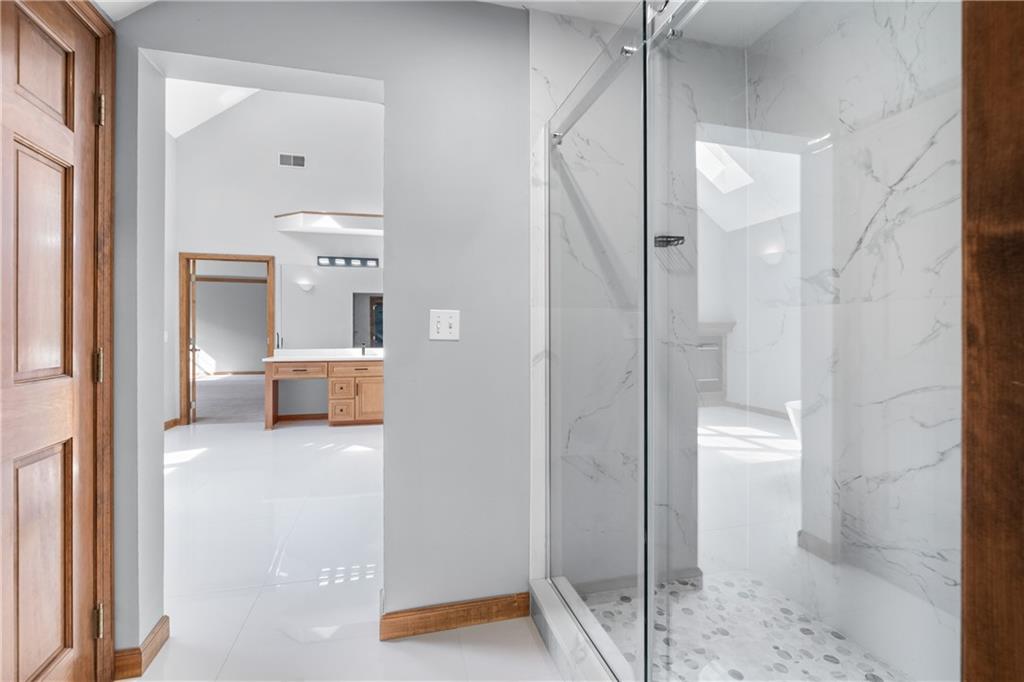 129 Purvis Road Butler, PA 16001 - Photo 34 of 50 a view of a bathroom with a tub and shower