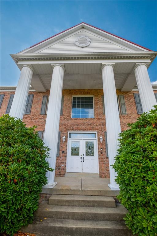 129 Purvis Road Butler, PA 16001 - Photo 4 of 50 a front view of a house
