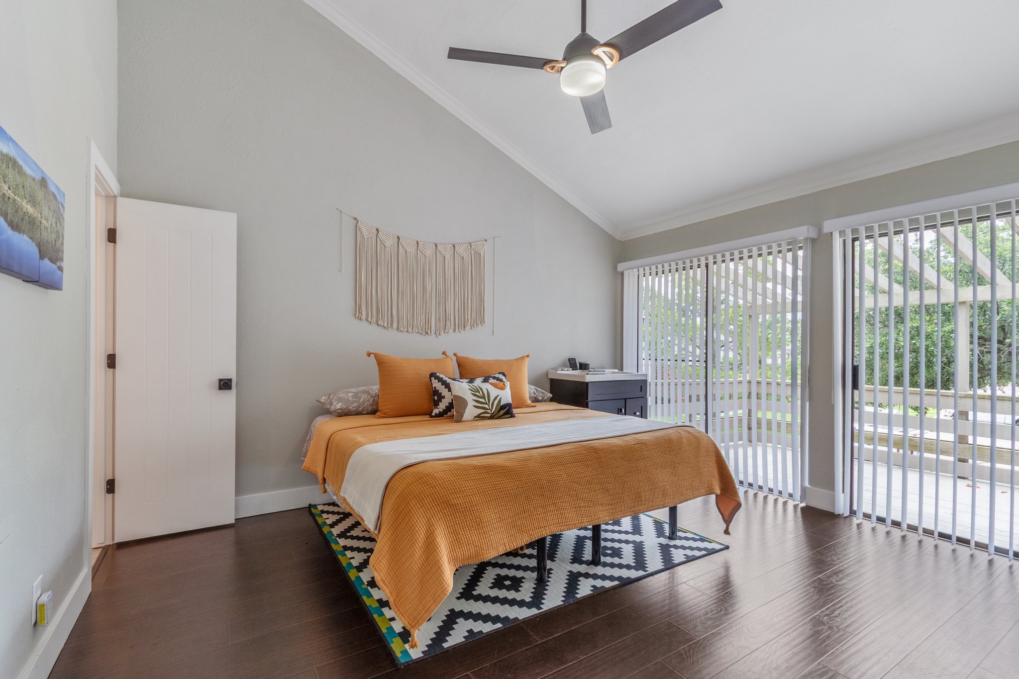 198 April Point Drive North Conroe, TX 77356 - Photo 21 of 34 a bedroom with a bed and a large window